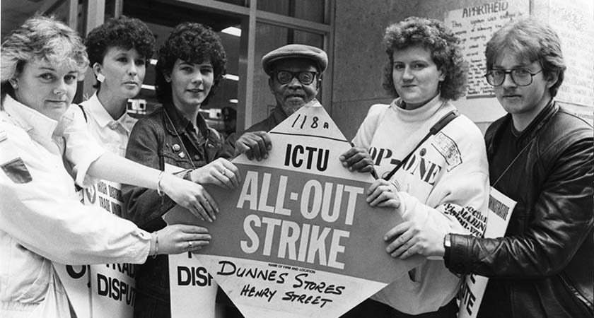 Nimrod Sejake (centre behind sign) with Dunnes Stores strikers during the 1984-87 strike